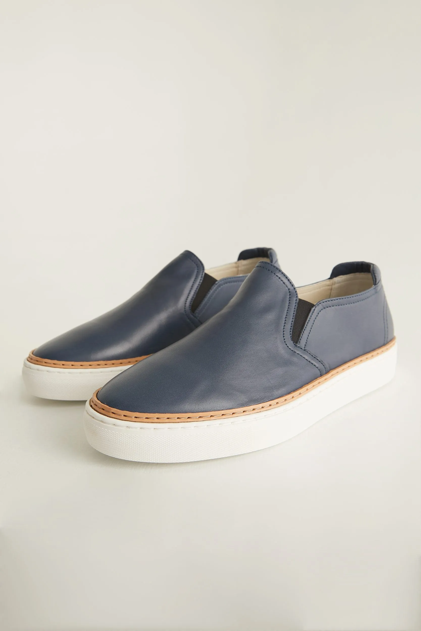 Leather slip-on sneaker sold by Tristan Style