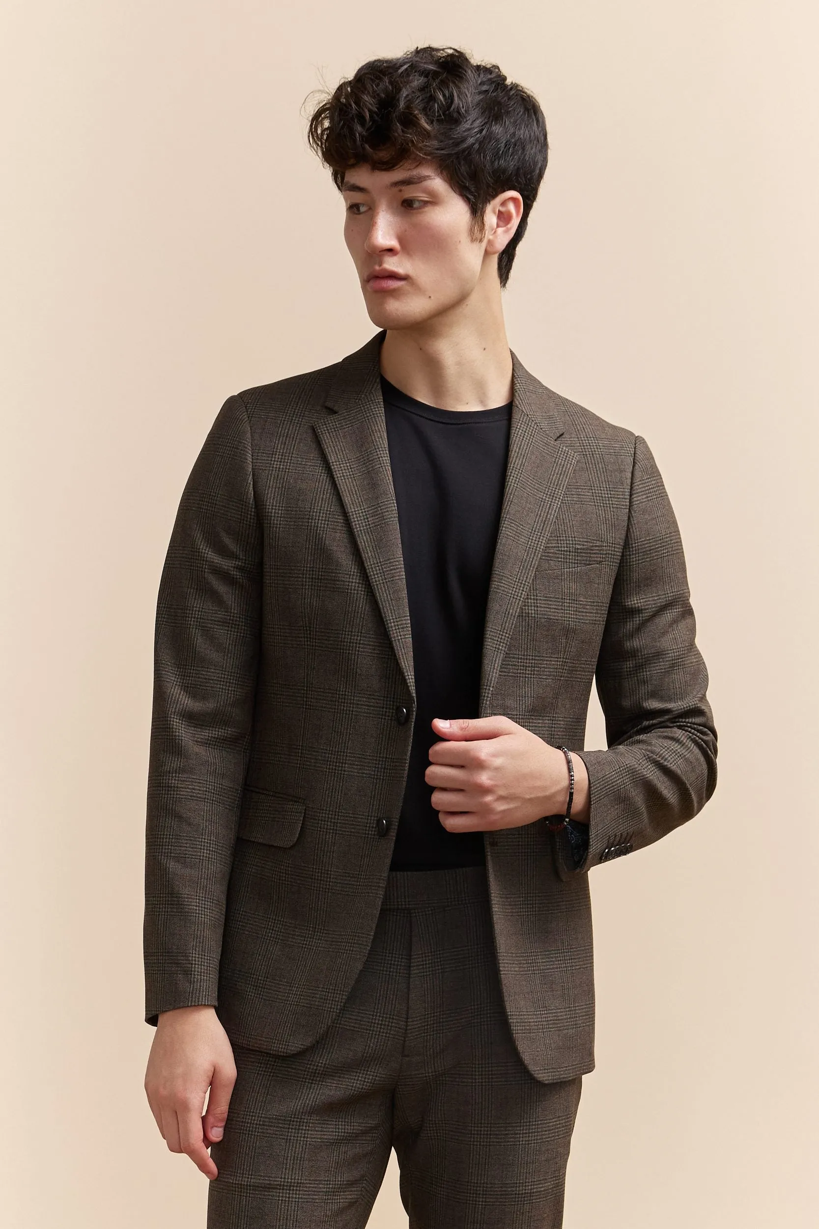 Extra-fitted check jacket sold by Tristan Style