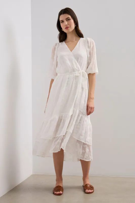 Embroidered ruffle dress sold by Tristan Style