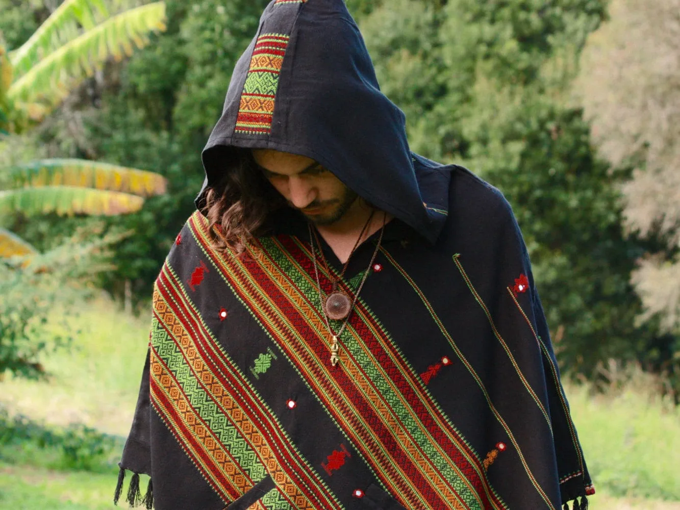 HODDI Black Poncho with Hood Cashmere and Acrylic Wool Earthy Tribal Pattern Festival Gypsy AJJAYA Mens Primitive Nomadic Mexican pockets sold by Ajjaya