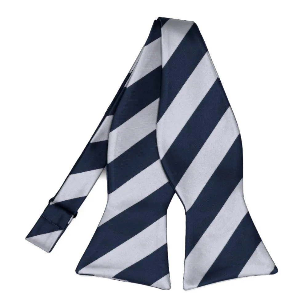 Navy Blue and Silver Striped Self-Tie Bow Tie sold by TieMart