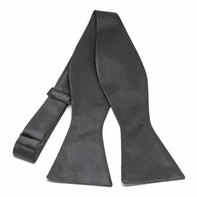 Graphite Gray Herringbone Silk Self-Tie Bow Tie sold by TieMart