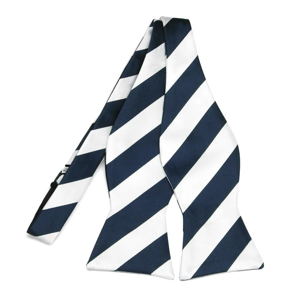 Navy Blue and White Striped Self-Tie Bow Tie sold by TieMart