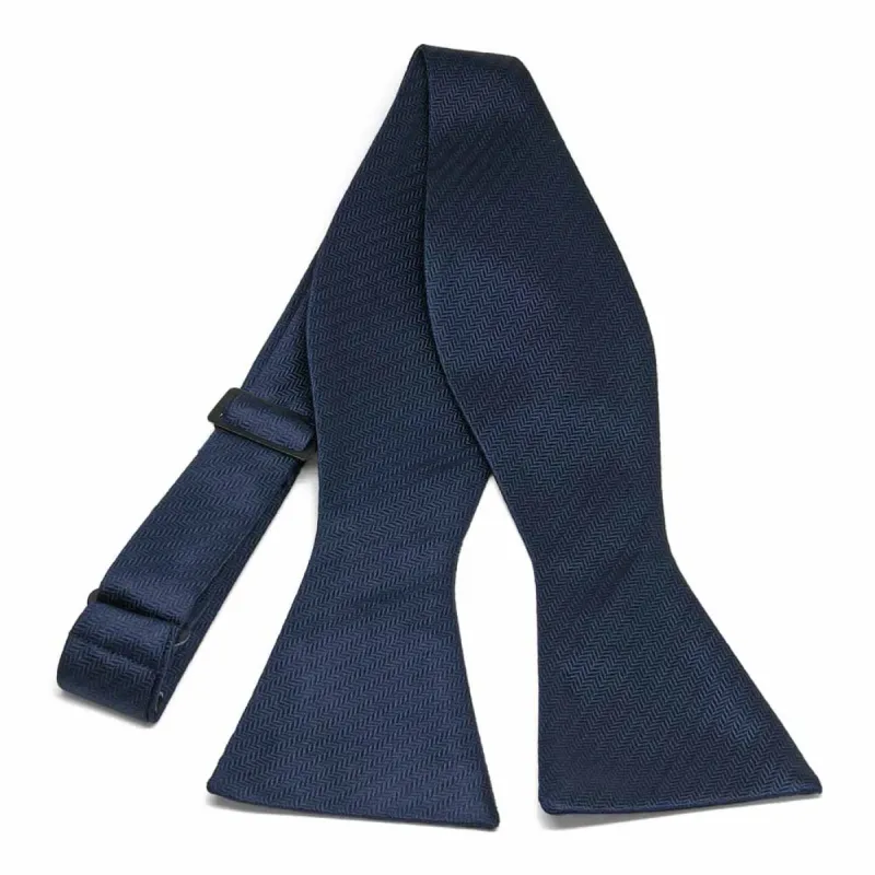 Navy Blue Herringbone Silk Self-Tie Bow Tie sold by TieMart
