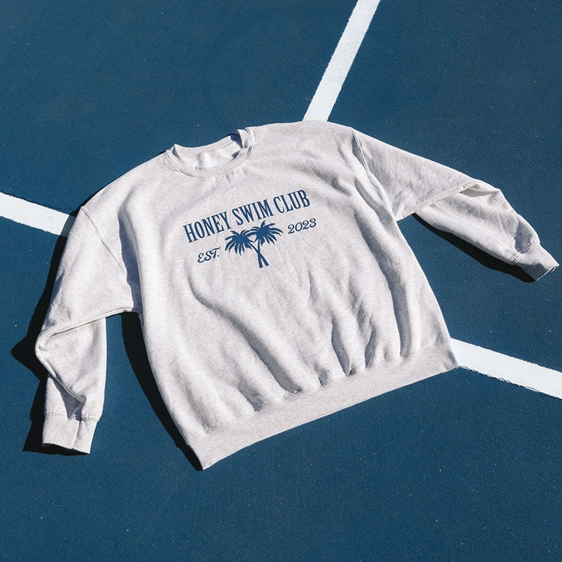 Honey Swim Palm Crewneck sold by Honey Swim