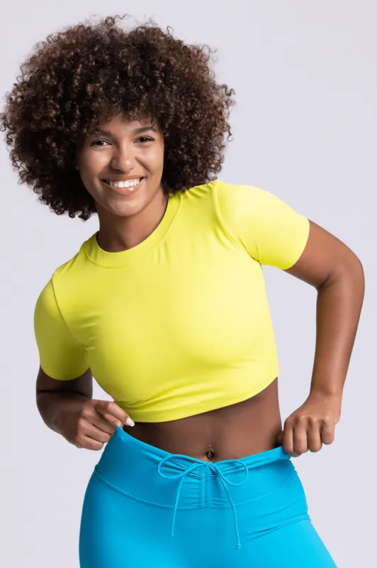 Aurora Short Sleeved Crop Rashguard - Glowstick sold by Jolyn