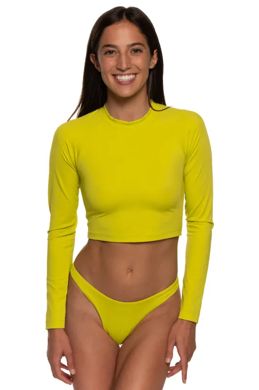 Moana Long Sleeved Crop Rashguard sold by Jolyn