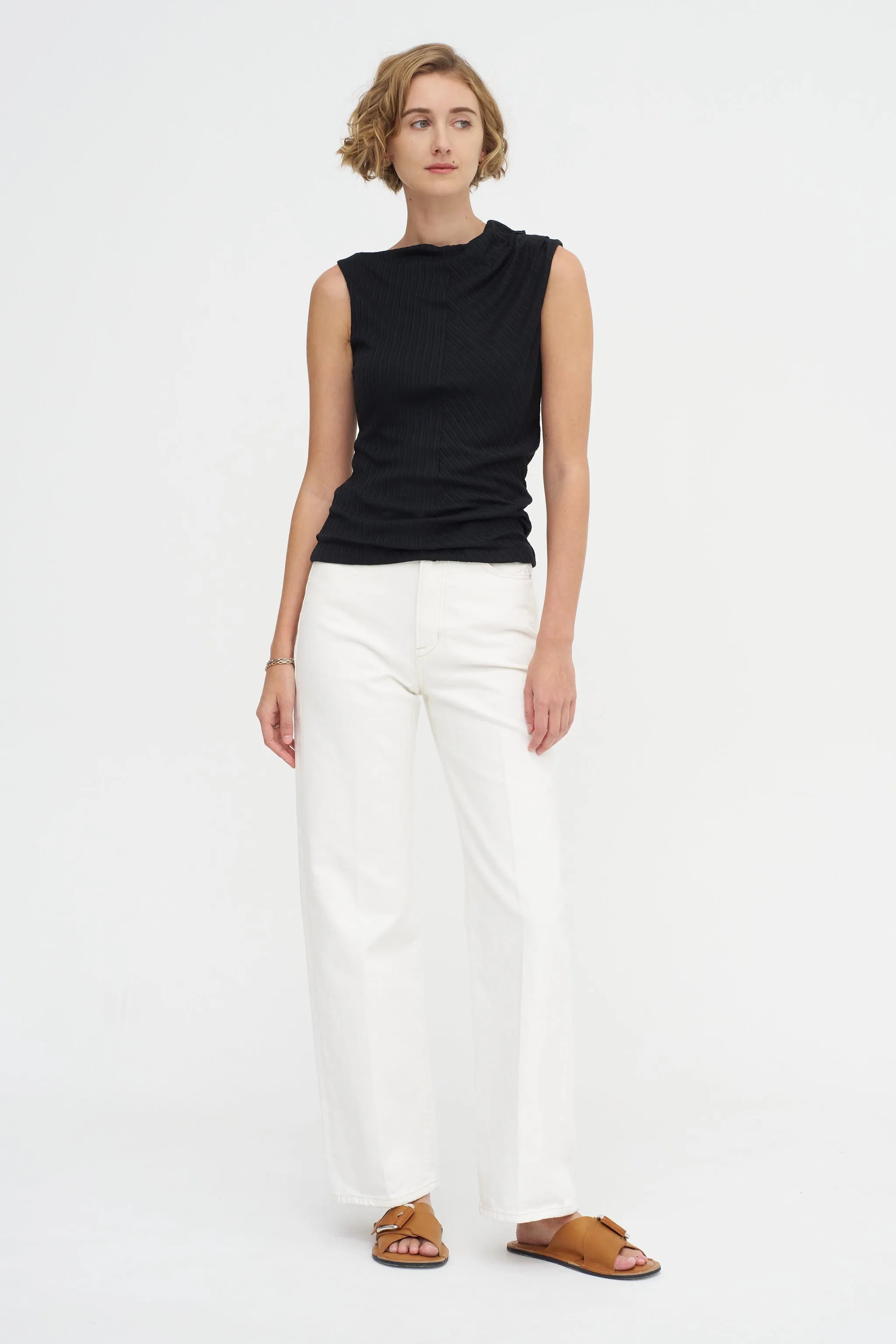 The Toga Sleeveless, Black sold by Kick Pleat