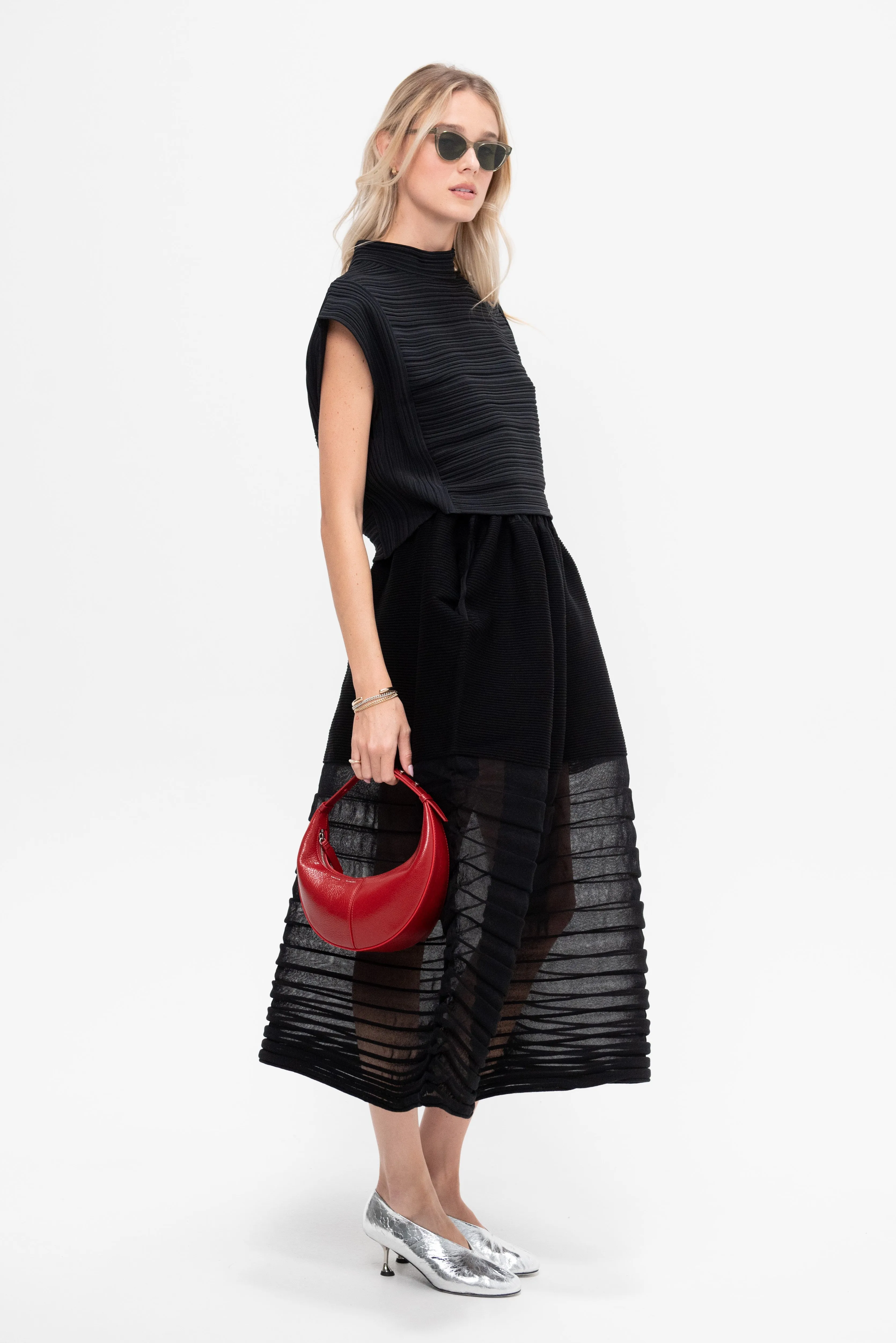 Moving Knit Skirt, Black sold by Kick Pleat