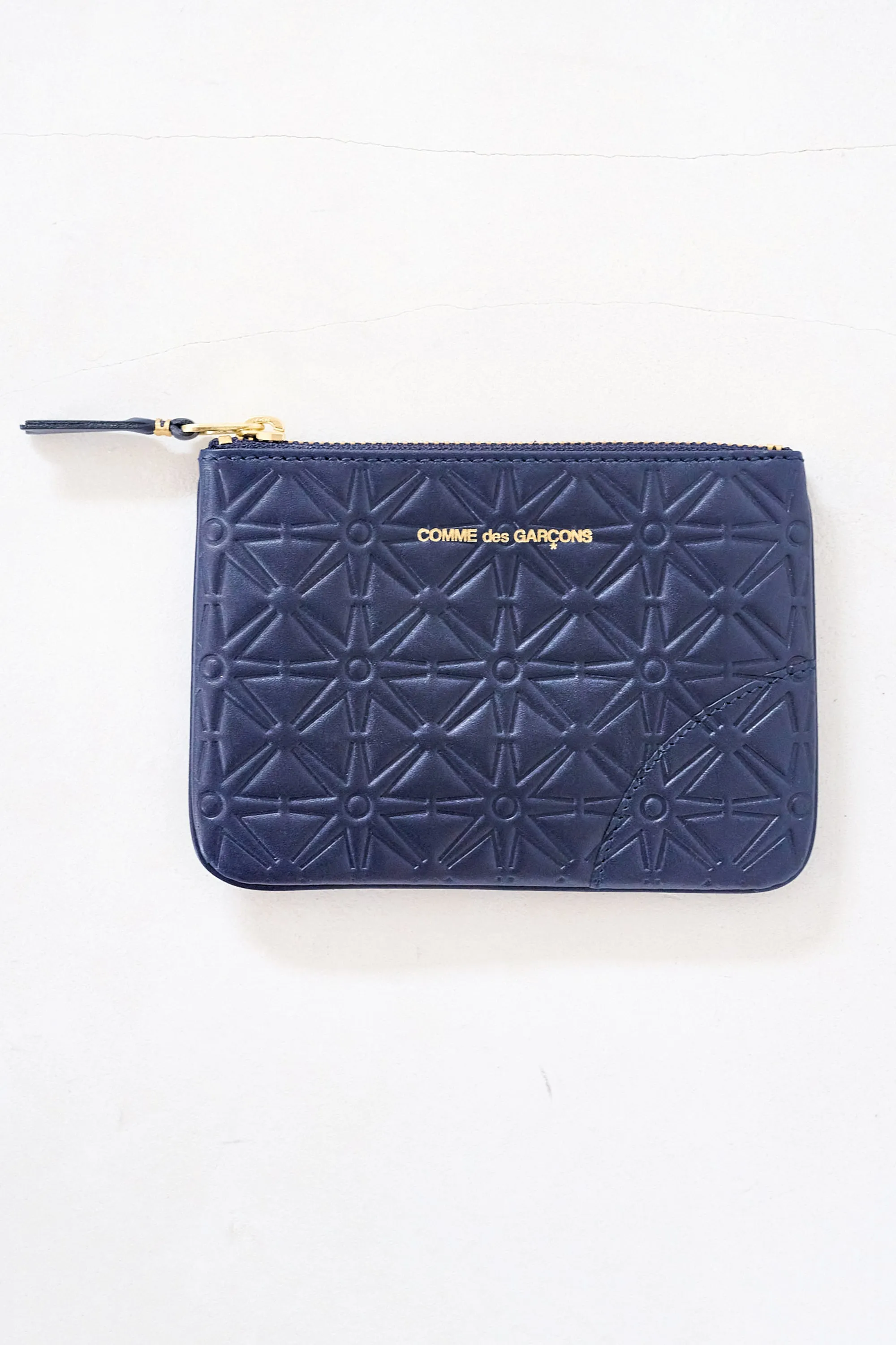 Small Embossed Pouch sold by Kick Pleat