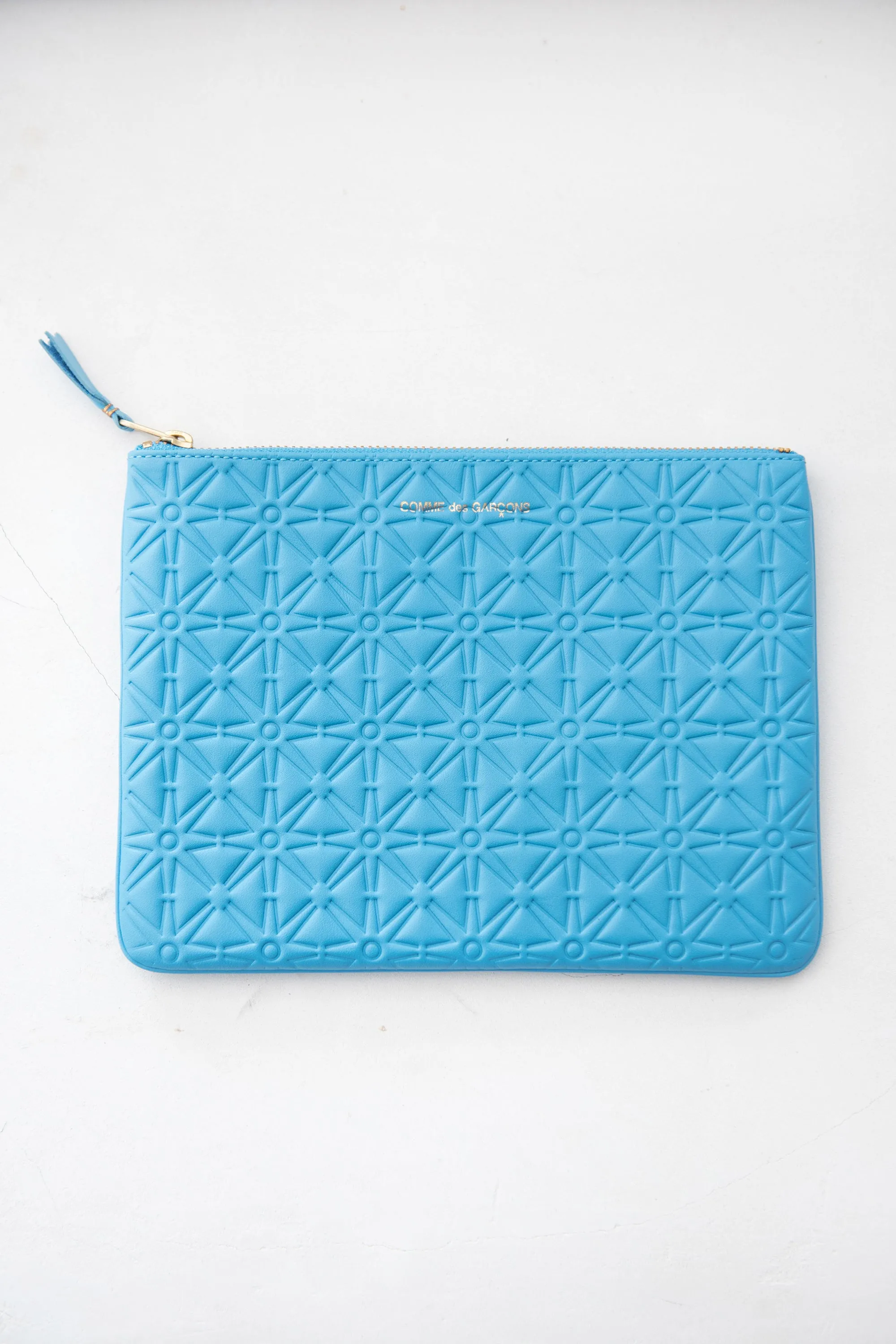 Embossed Leather Zip Pouch sold by Kick Pleat