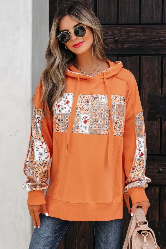 Myrassa Side Slit Drawstring Hoodie sold by Threaded Pear