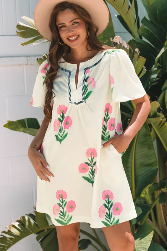 Paloma Floral Short Sleeve Split Neck Loose Mini Dress sold by Threaded Pear