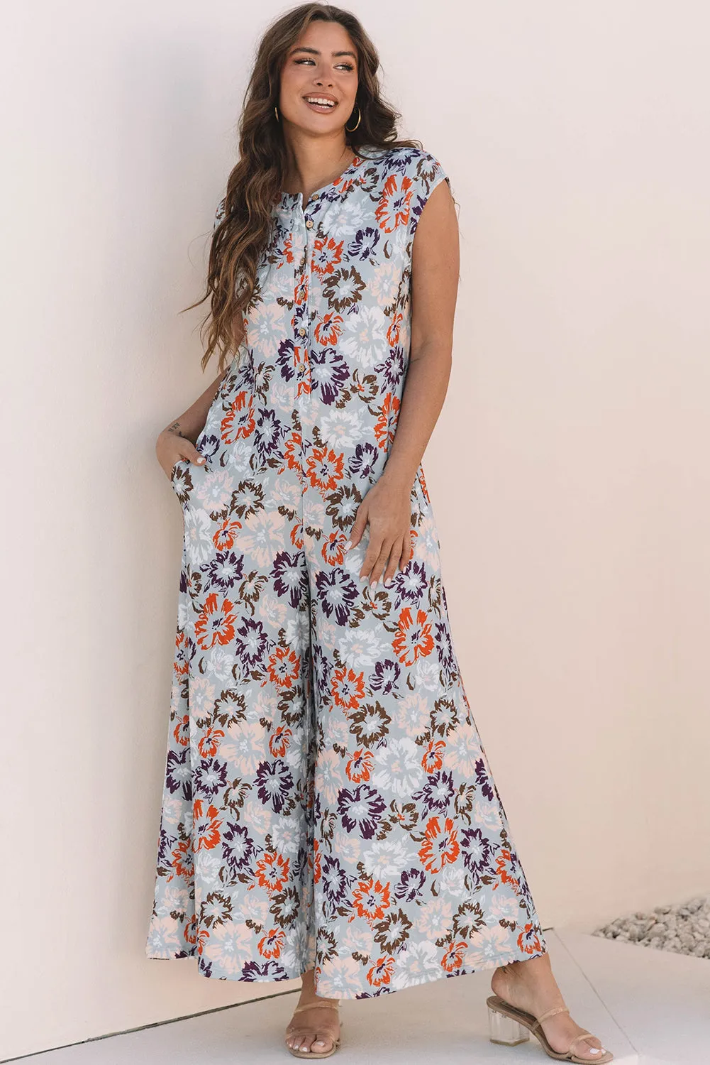 Kylee Floral Sleeveless Buttoned Wide Leg Jumpsuit sold by Threaded Pear
