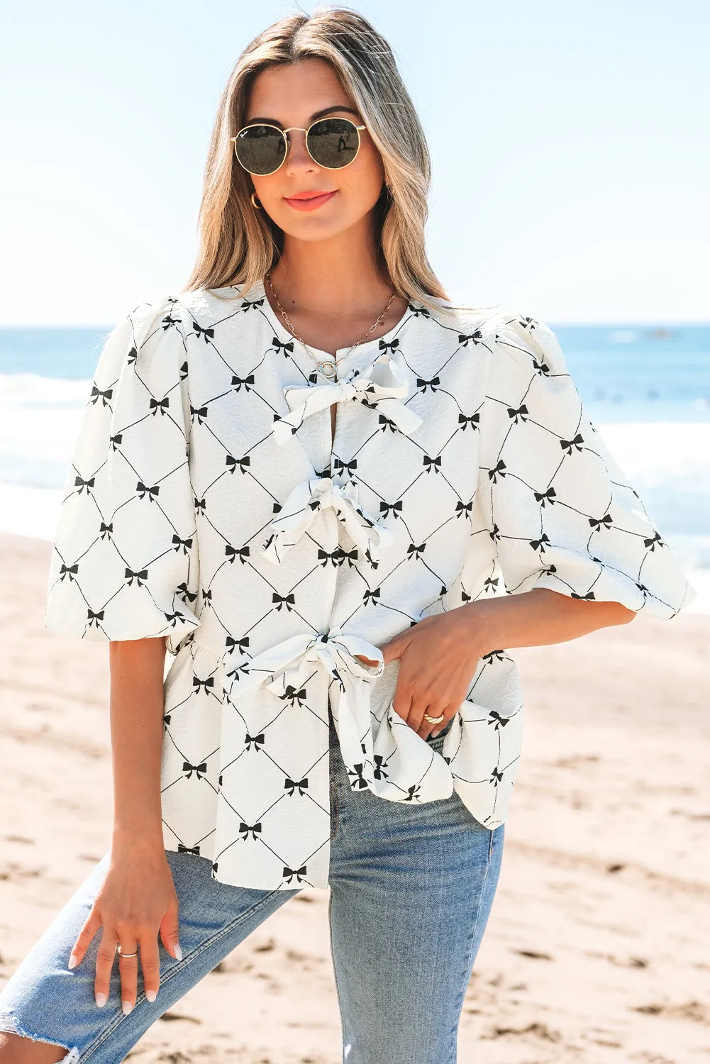 Ezra Bowknot Print Front Knots Bubble Sleeve Blouse sold by Threaded Pear