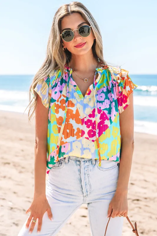 Rosa Flutter Sleeve V Neck Crinkled Blouse sold by Threaded Pear