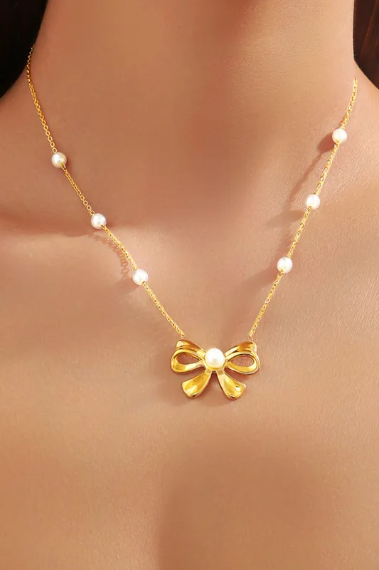 Gold Pearl Decor Plated Bow Knot Pendant Necklace sold by Threaded Pear