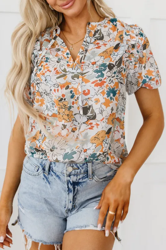 Milena Split V Neck Puff Sleeve Flower Print Blouse sold by Threaded Pear