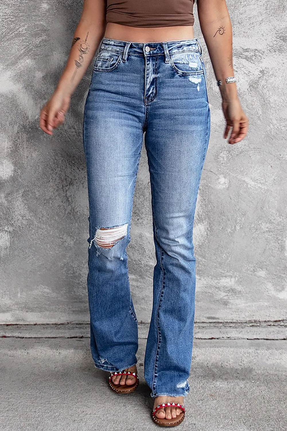 Angelina Distressed Flare Jeans sold by Threaded Pear