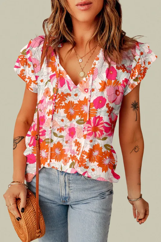 Joy Split V Neck Ruffle Sleeve Floral Blouse sold by Threaded Pear