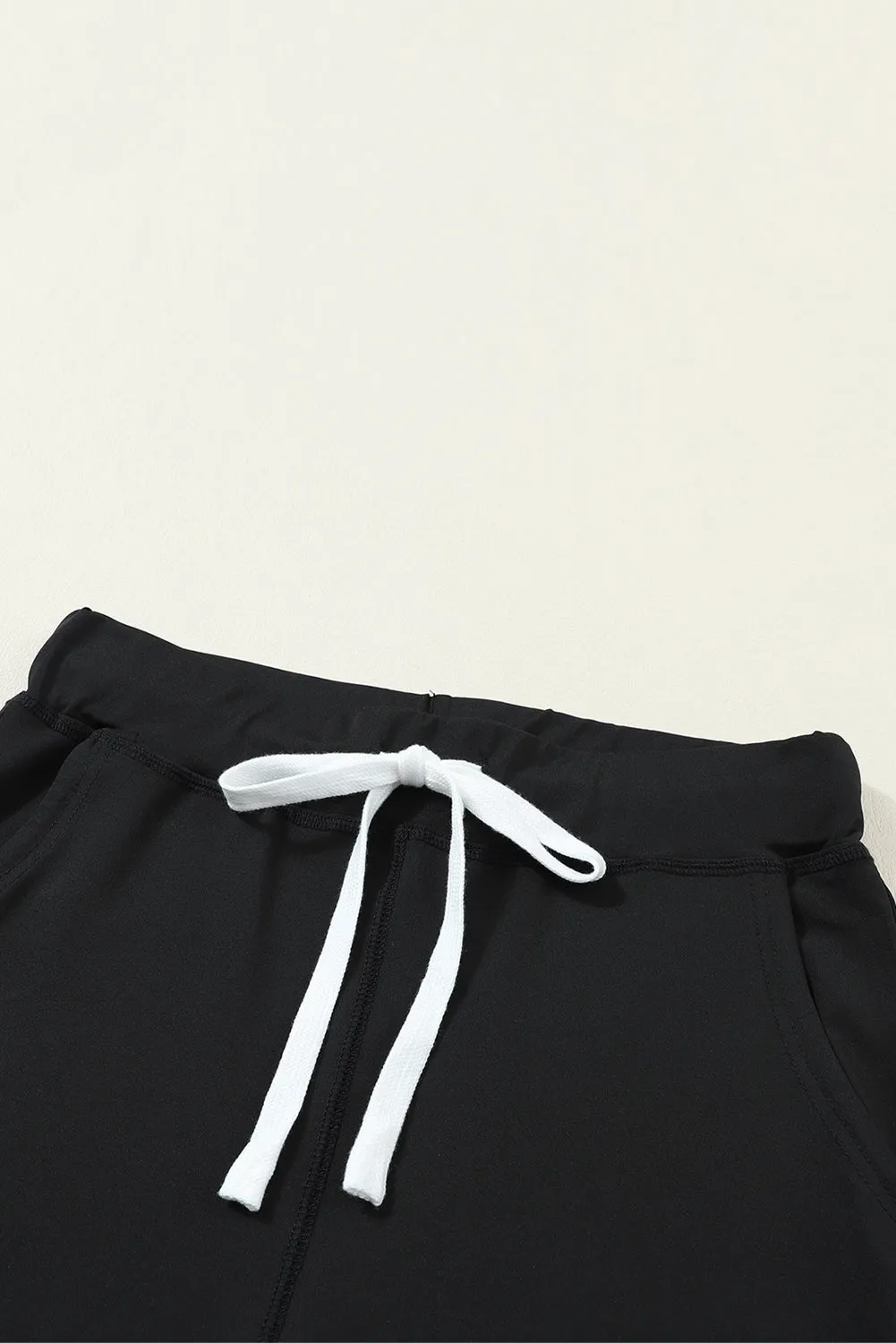 River Drawstring Waist Pocketed Leggings sold by Threaded Pear product image thumbnail 2