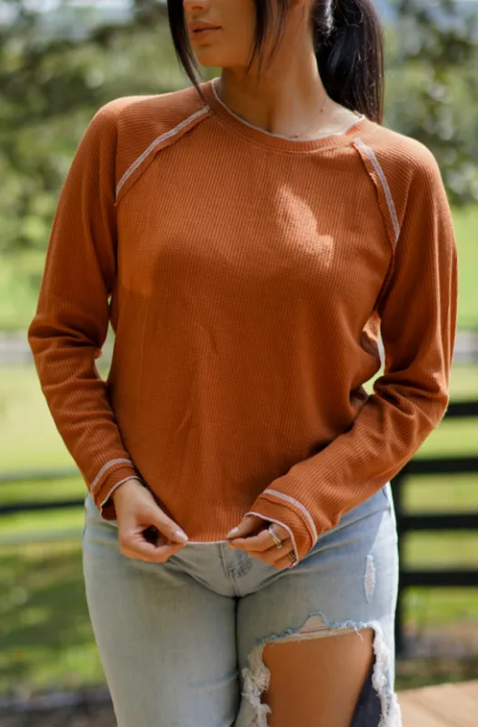 Cataleya Textured Round Neck Long Sleeve Top made by Threaded Pear