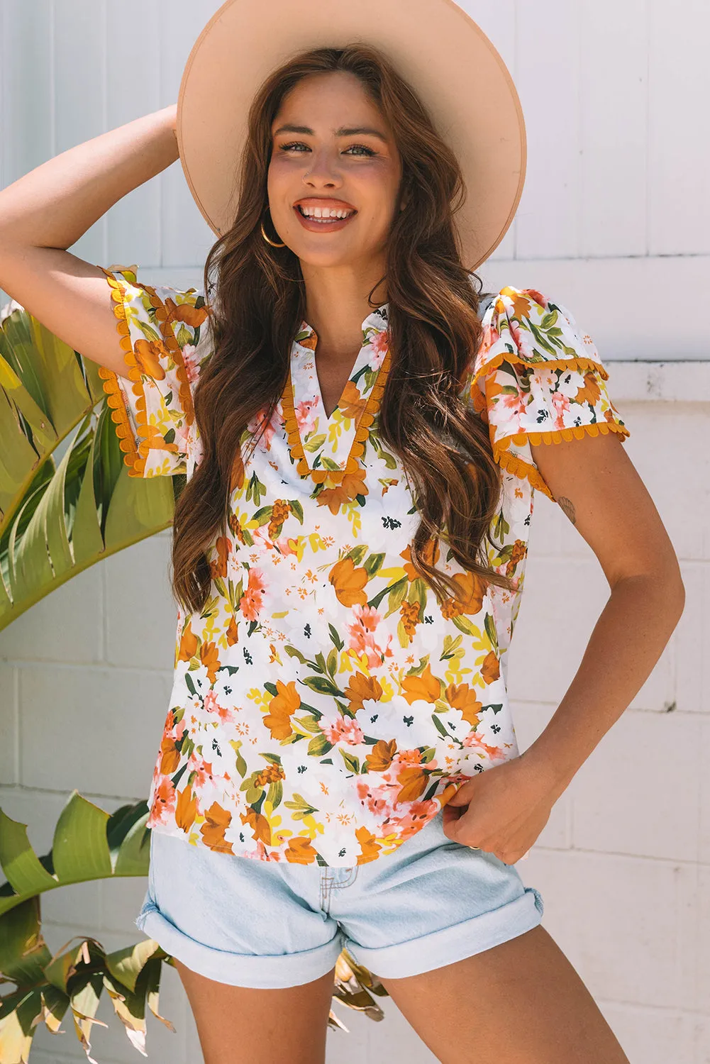 Ailany Short Sleeve Floral Blouse sold by Threaded Pear