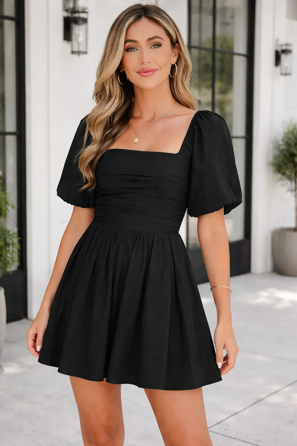 Malaysia Ruched Puff Sleeve Romper sold by Threaded Pear