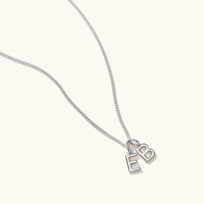 Mini Double Letter Necklace Silver sold by Muru