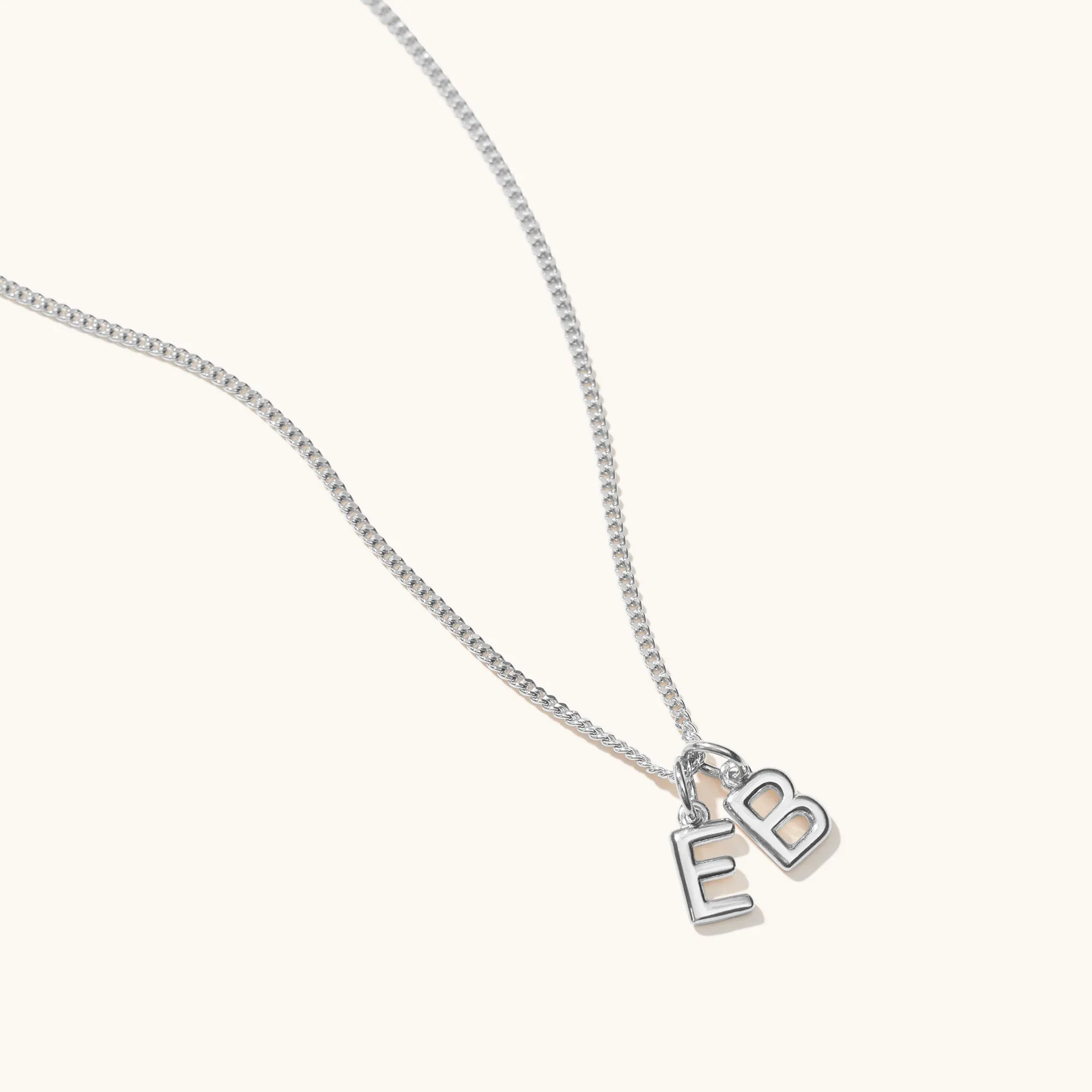 Mini Double Letter Necklace Silver sold by Muru