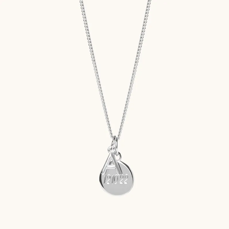 Personalised Disc & Letter Necklace Silver sold by Muru