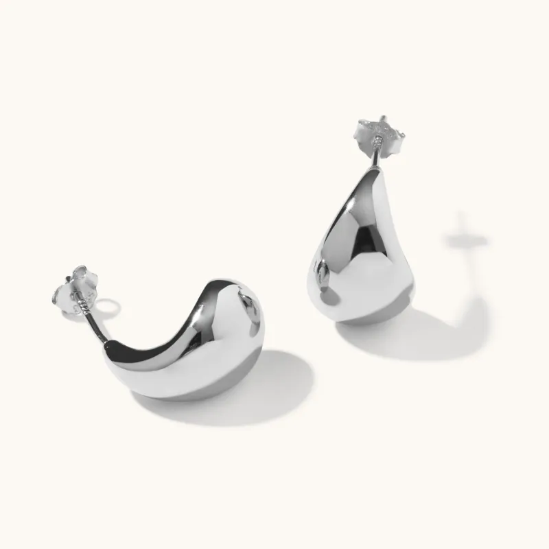 Tear drop statement studs silver sold by Muru