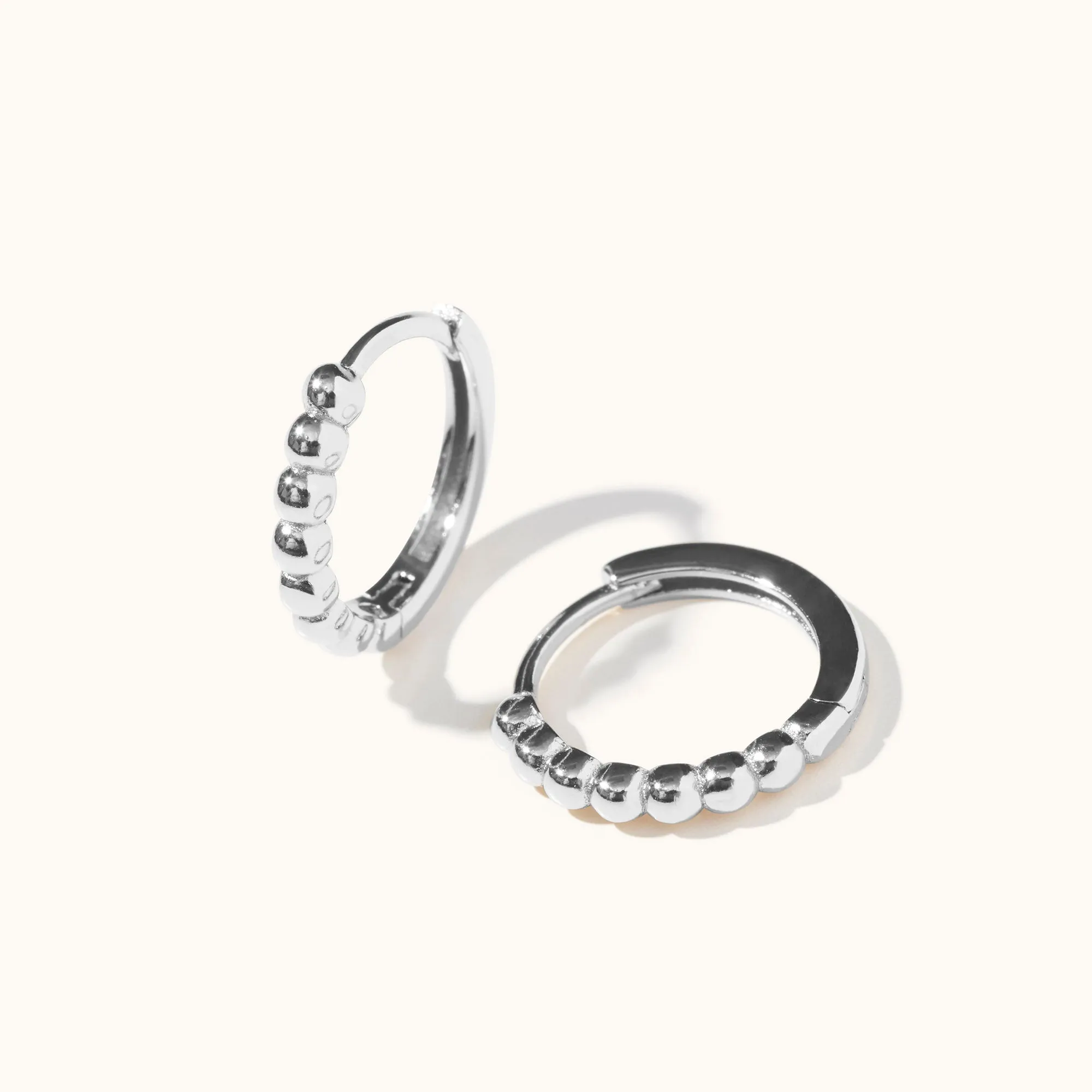 Mini Sun Hoops Silver sold by Muru