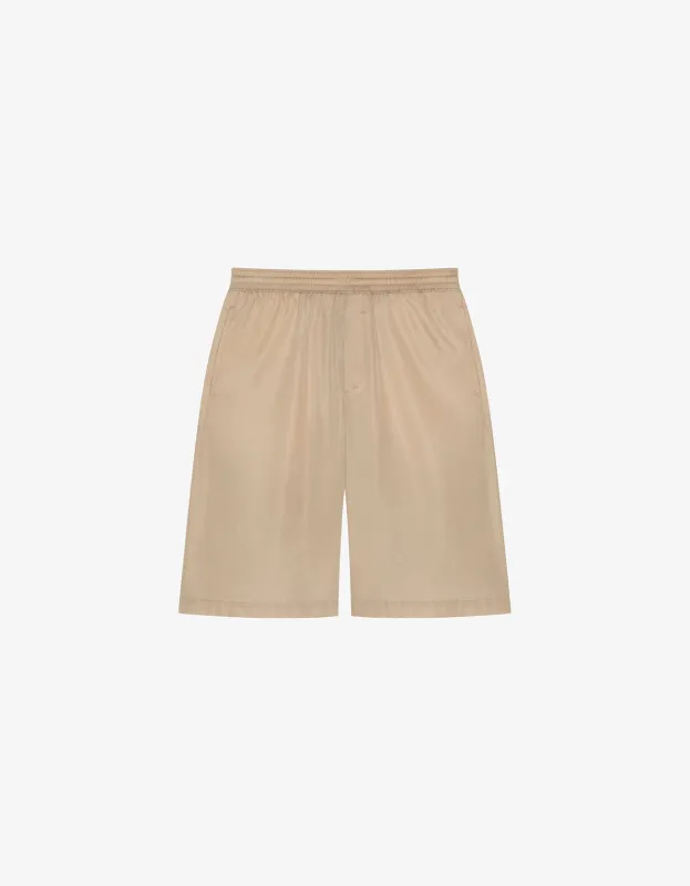 Givenchy Beige Bermuda Shorts sold by Zoo Fashions