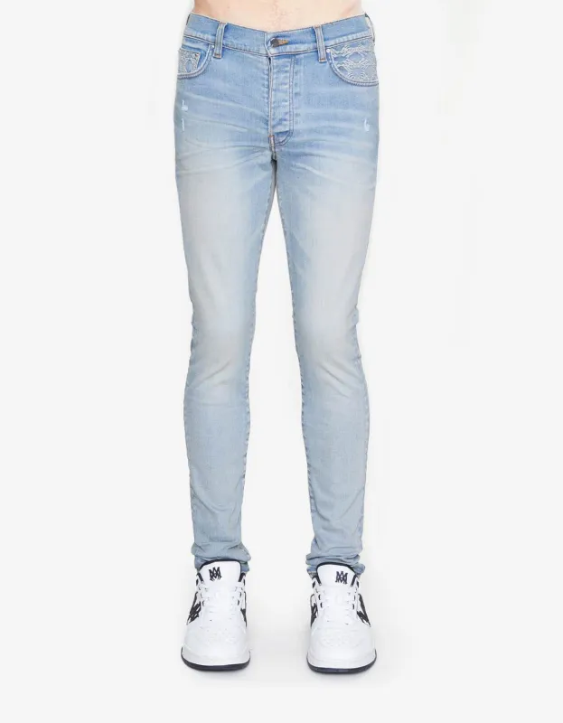 Amiri Blue MA Quad Contrast Skinny Jeans made by AMIRI