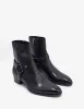 Saint Laurent Black Wyatt 40 Harness Boots sold by Zoo Fashions