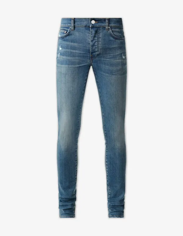 Amiri Dark Indigo Stack Jeans sold by Zoo Fashions