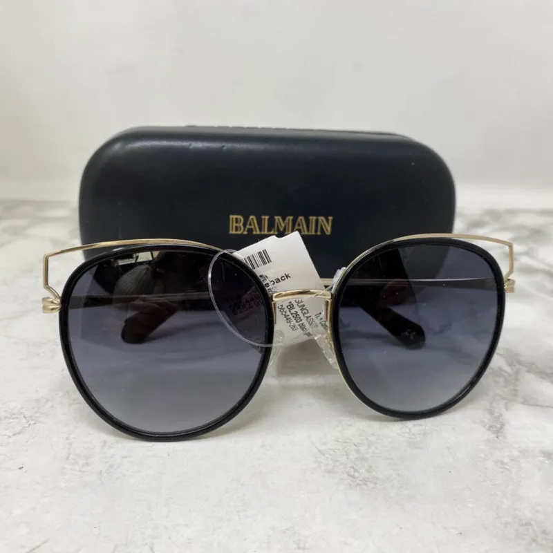 BALMAIN WOMEN'S SUNGLASSES black gold sold by The Comeback