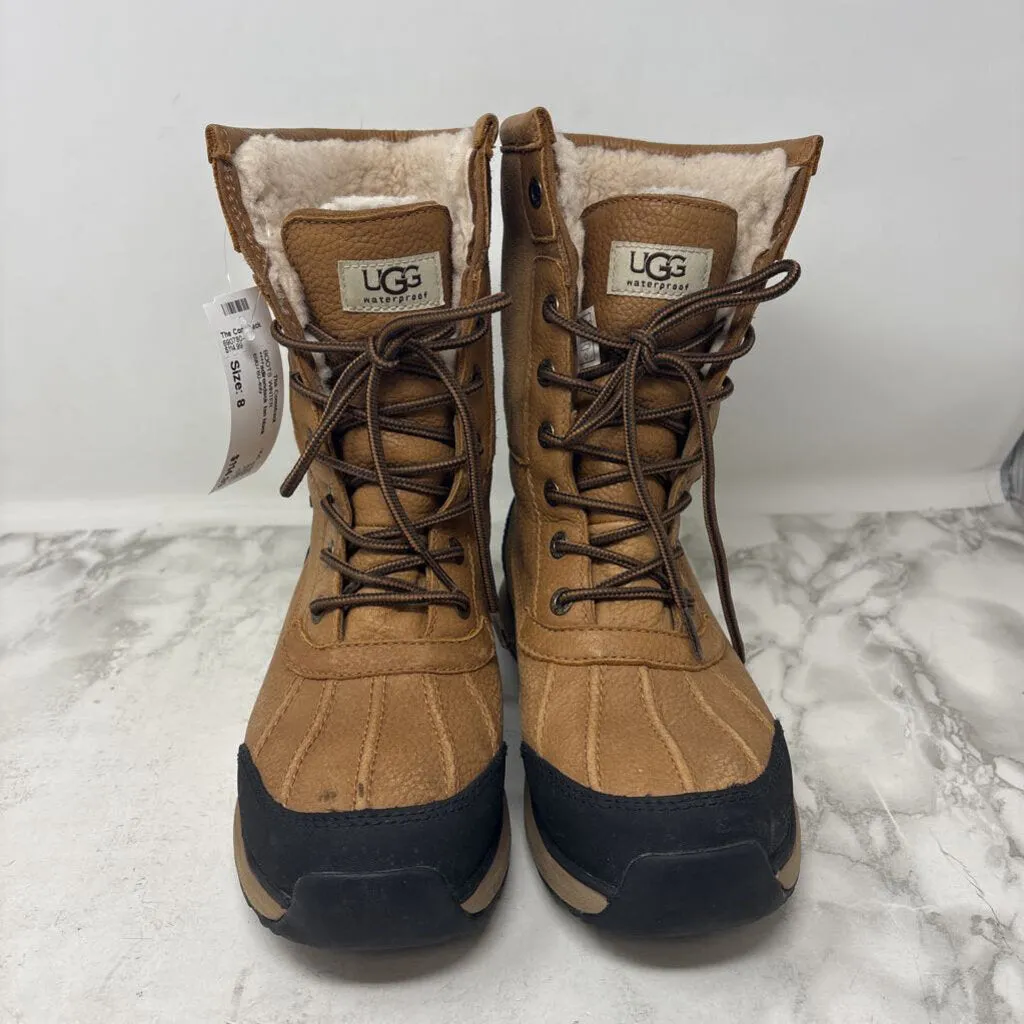 UGG WOMEN'S BOOTS WINTER tan black 8 sold by The Comeback