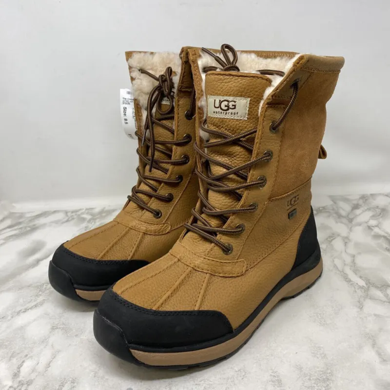 UGG WOMEN'S BOOTS WINTER tan black 8.5 sold by The Comeback