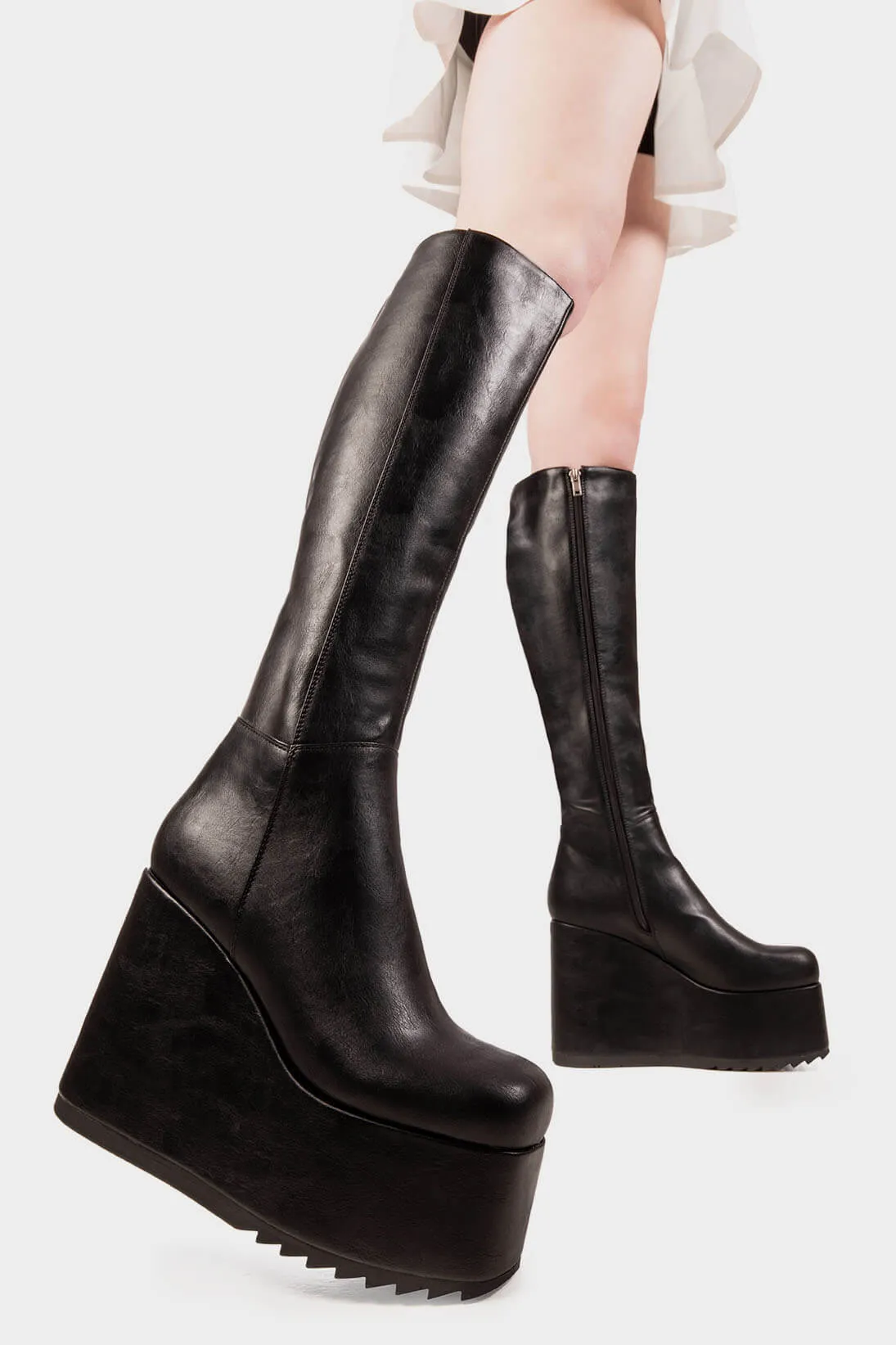 Right Hand Chunky Platform Knee High Boots sold by Lamoda