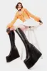 Right Hand Chunky Platform Knee High Boots sold by Lamoda