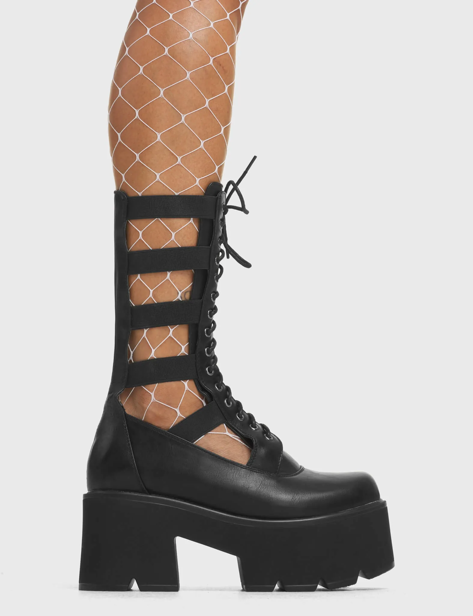 Blatant Chunky Platform Calf Boots sold by Lamoda