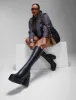 Slick Nicks Super Stretch Platform Knee High Boots sold by Lamoda