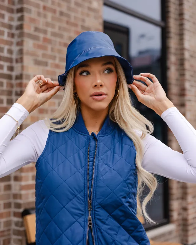 Rain Hats sold by Mernini