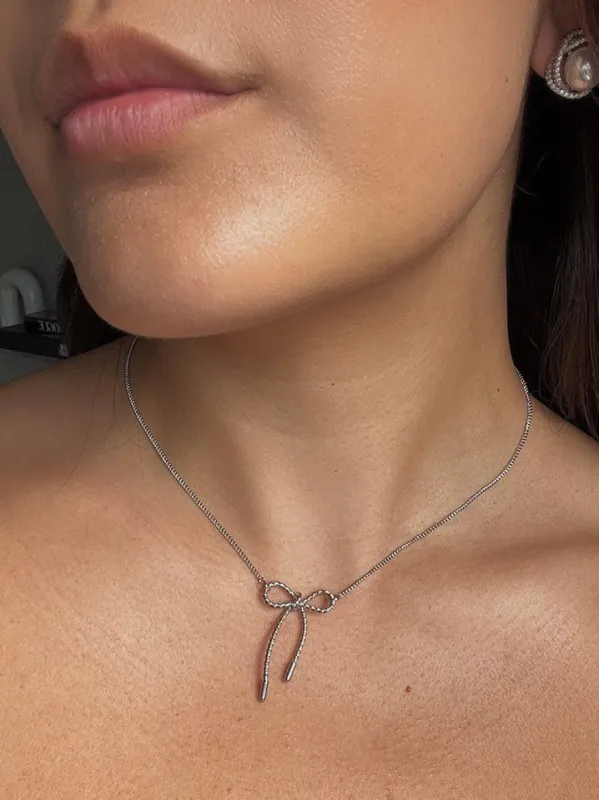 27 Metal Bow Necklace sold by 27 Boutique