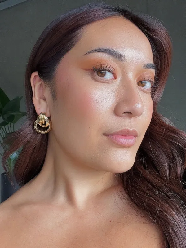 27 Twisted Hoop Earrings sold by 27 Boutique