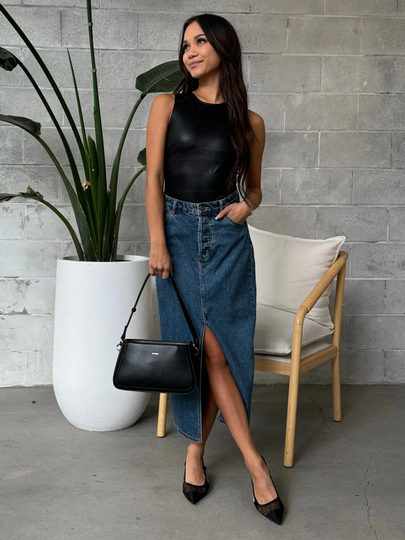 BLACK TAPE Faux Leather Bodysuit sold by 27 Boutique