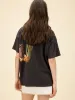 DAYDREAMER Kick Your Boots Off Merch Tee sold by 27 Boutique