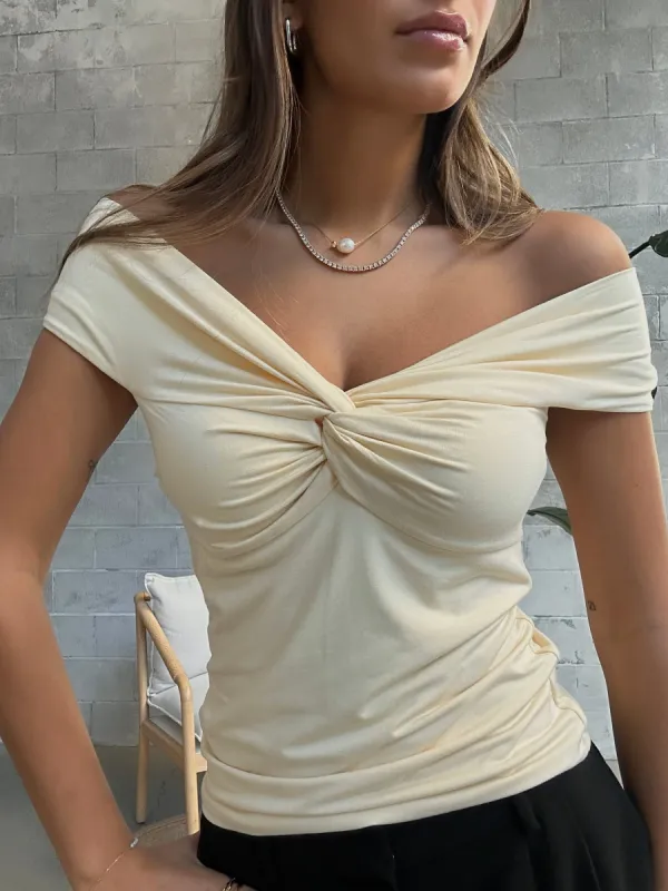 BLACK TAPE Off Shoulder Twist Detail Top sold by 27 Boutique